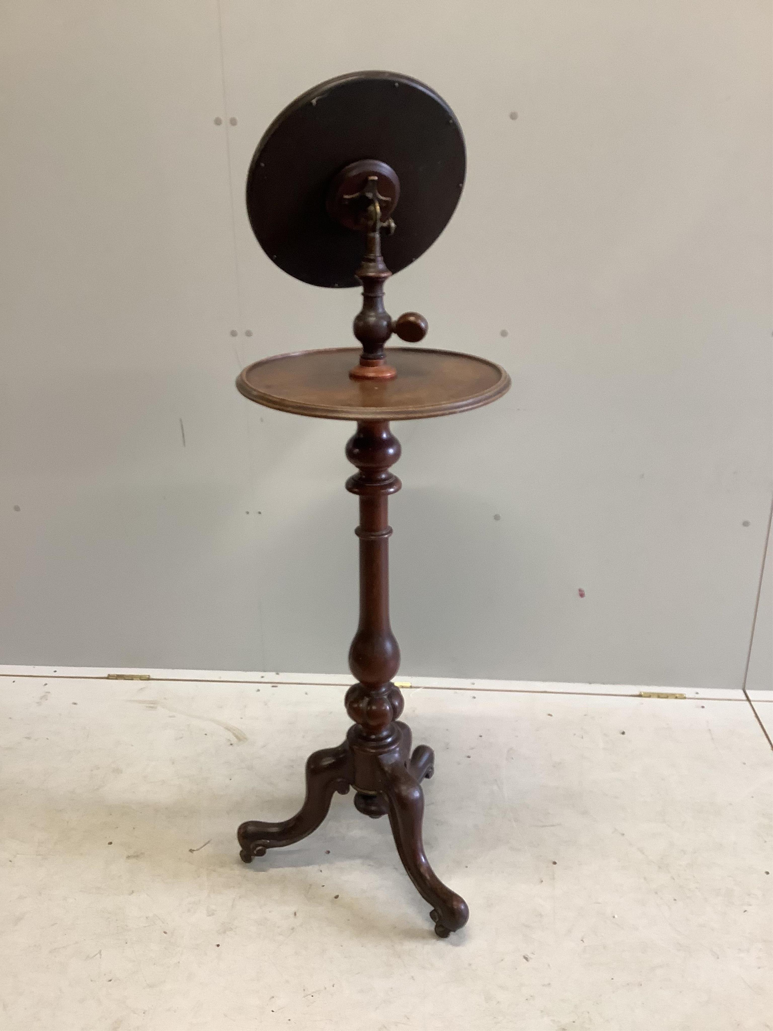 A Victorian mahogany shaving stand on carved tripod base, height 140cm. Condition - fair